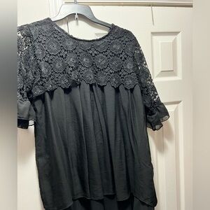 Blouse with polyester blend bodice and crocheted neck line